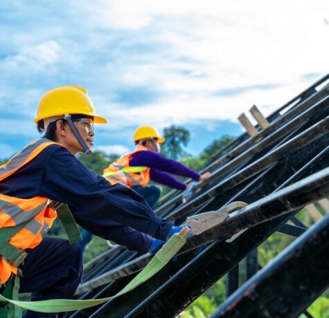 engineer-wearing-safety-harness-and-safety-line-working-at-high-place-at-construction-sites